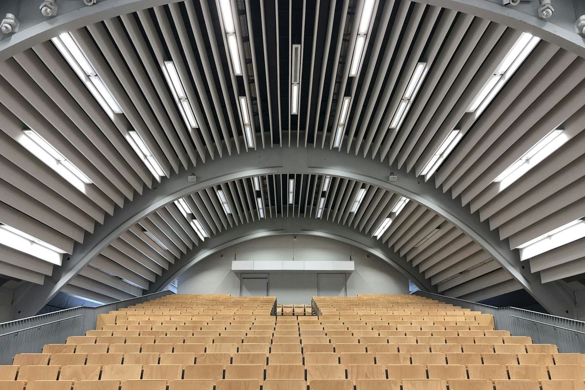 Empty tiered seating in a modern lecture theatre